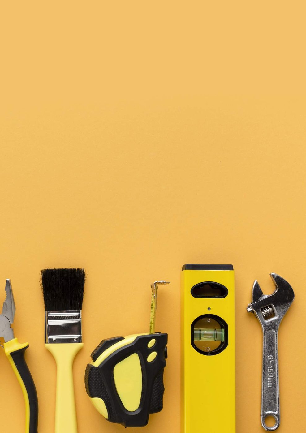 Building tools arranged on an orange background